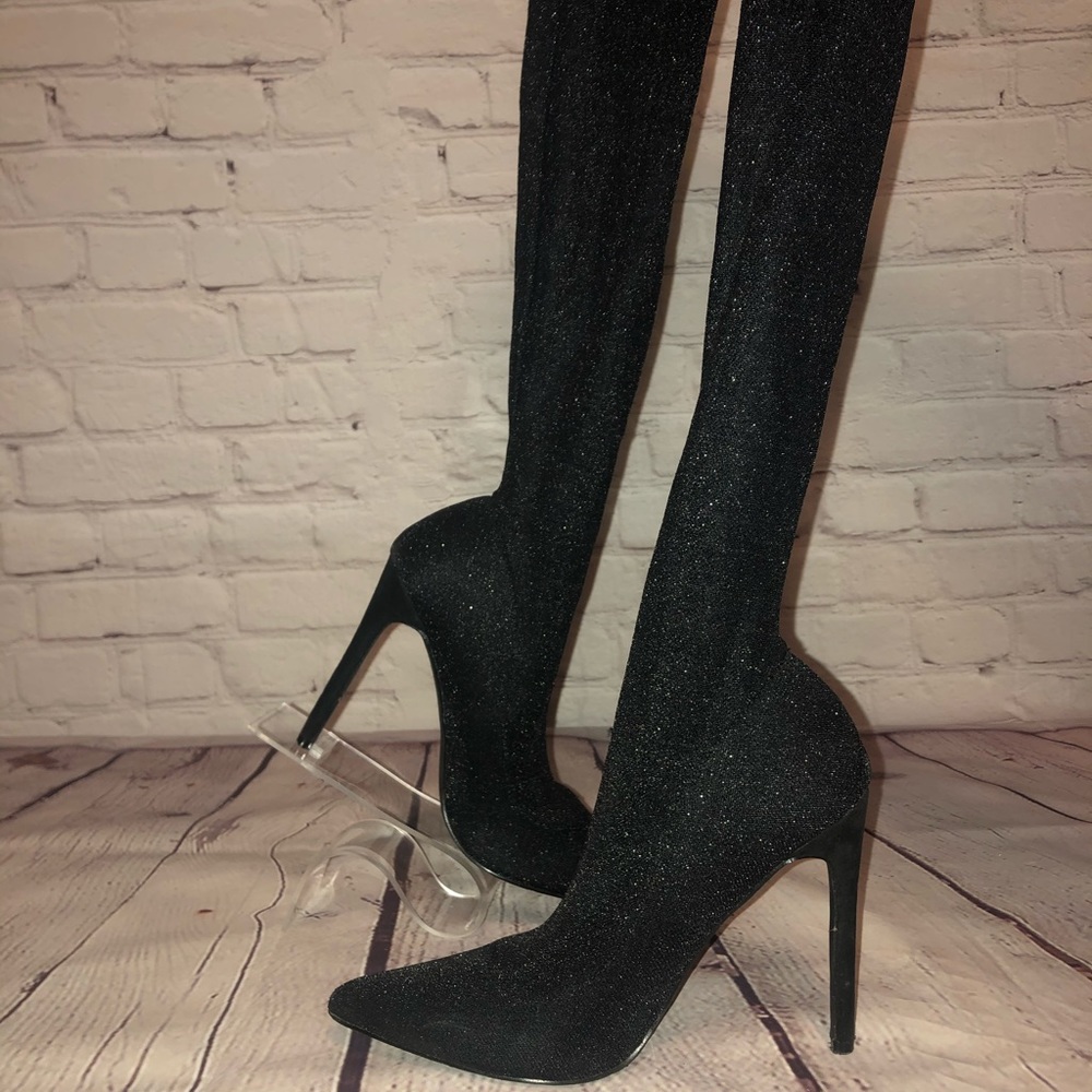 Thigh high sock/tight boot heels.